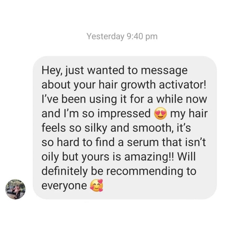 Text message praising a hair growth activator with emojis on a light gray background