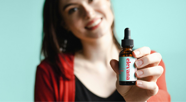 Holding elevana bottle