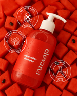Red shampoo bottle with pump on a red watermelon background, featuring 'elevana' brand.